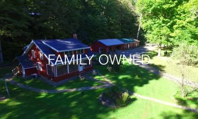 Wellneste Lodge in Taberg NY Drone View of Cabin Rentals, Fish Creek River and Retreat Center